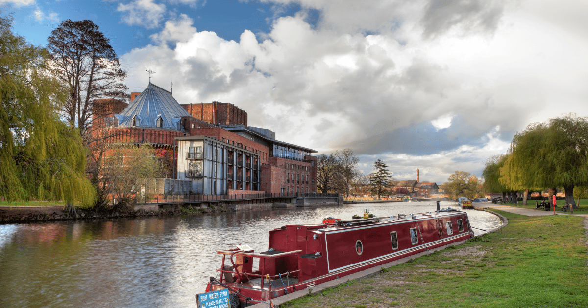 Royal Shakespeare Theatre on the riverbank of the River Avon.