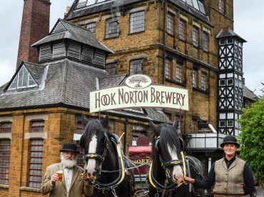 hook norton brewery and carriage with horses