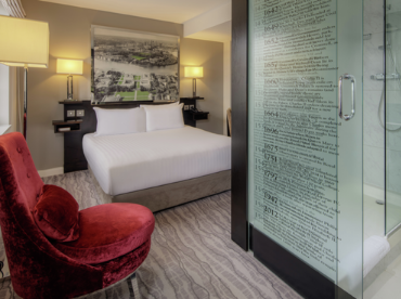A freshly-made bed with crisp white cotton sheets at the DoubleTree by Hilton London Greenwich