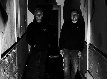 2 men black and white haunting