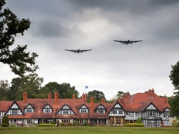 WW2 era bombers performing a flyover in Woodhall Spa over the Petwood Hotel