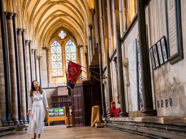 Woman walking through Salisbury Cathedral