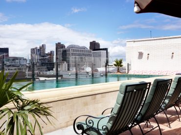 Rooftop swimming pool with views of the City